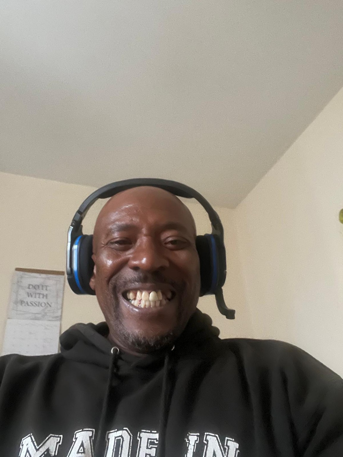 Stephen 'HeroicHilton' Hilton smiling while wearing his gaming headset